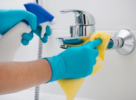 Local cleaners working in a Brent apartment building with access challenges